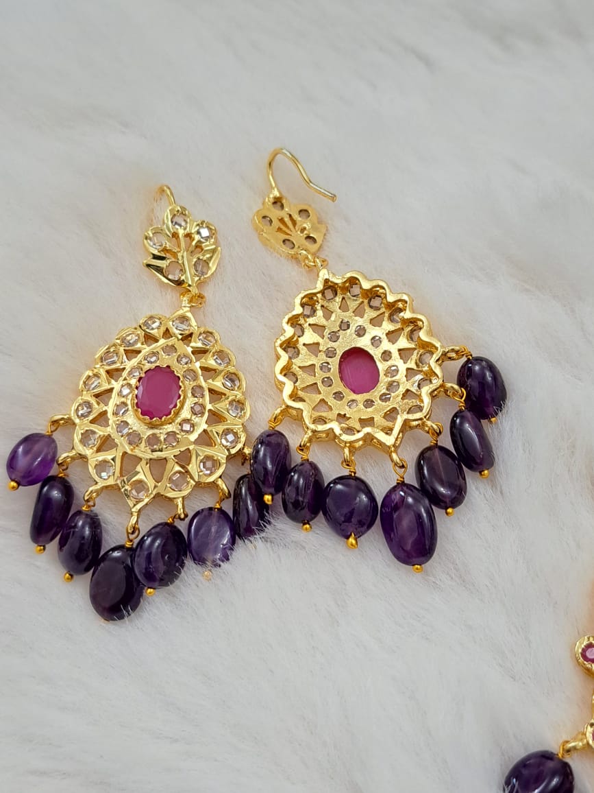 HYDERABADI JADAU PEARL SET WITH AMETHYST AND RUBY PAIRED WITH TEARDROP DANGLERS