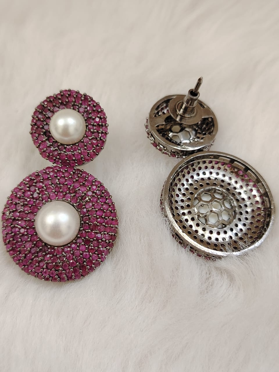 Sabyasachi inspired earring studded with pink stones and pearls