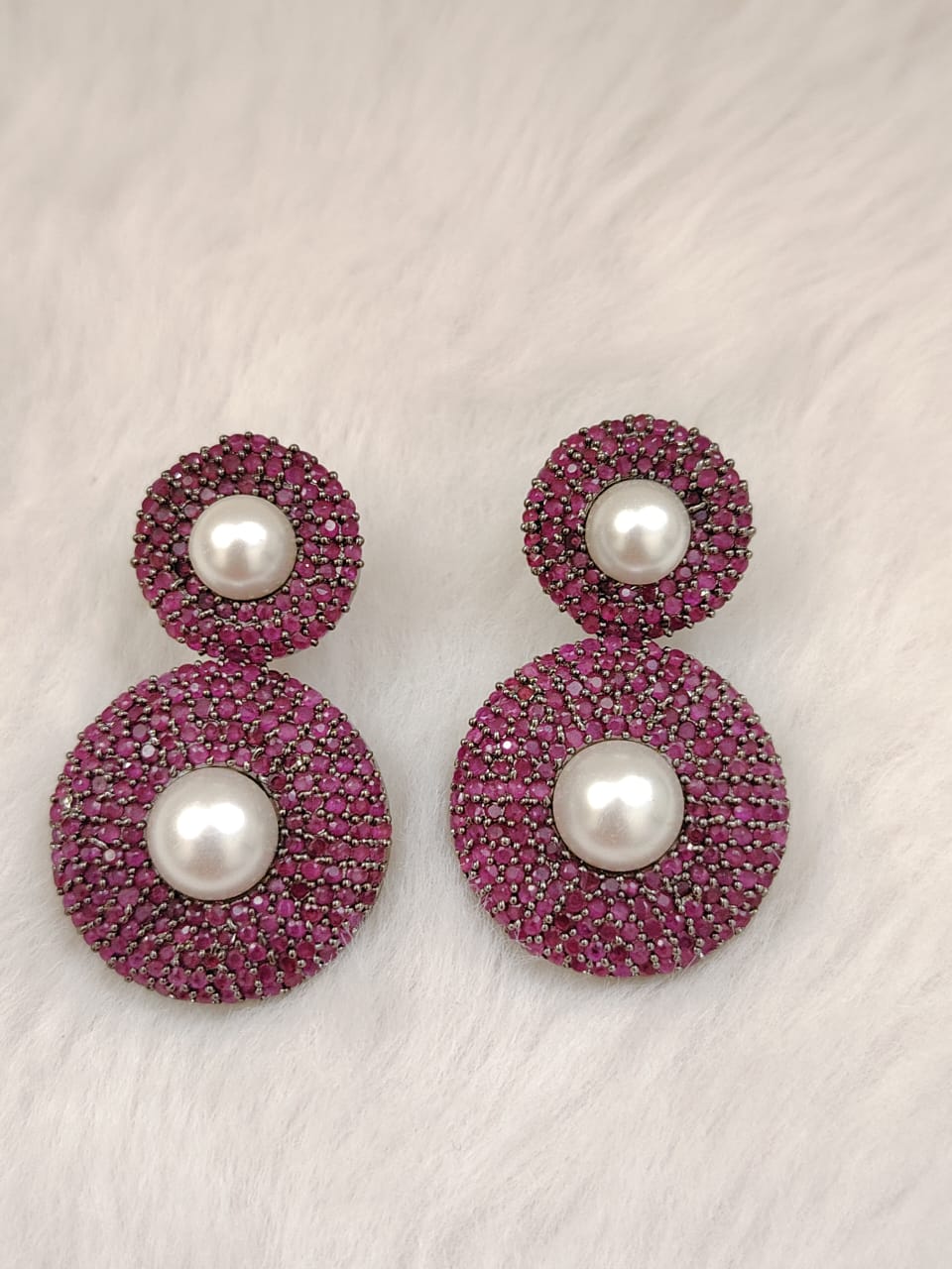 Sabyasachi inspired earring studded with pink stones and pearls
