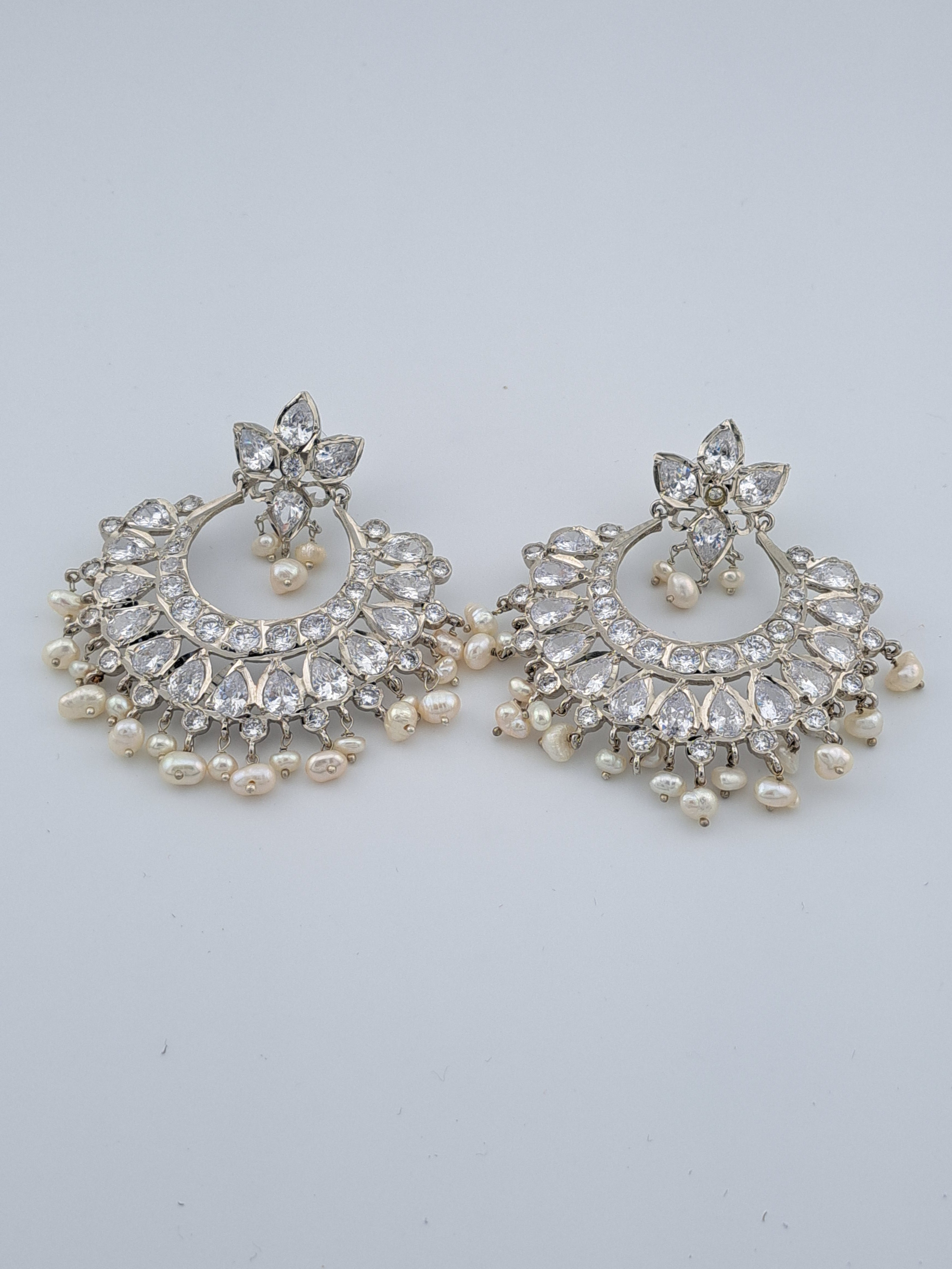 HYDERABADI JADAU SILVER FINISH UNCUT STONE CHANDBALIS WITH REAL PEARL PUROI DROPS