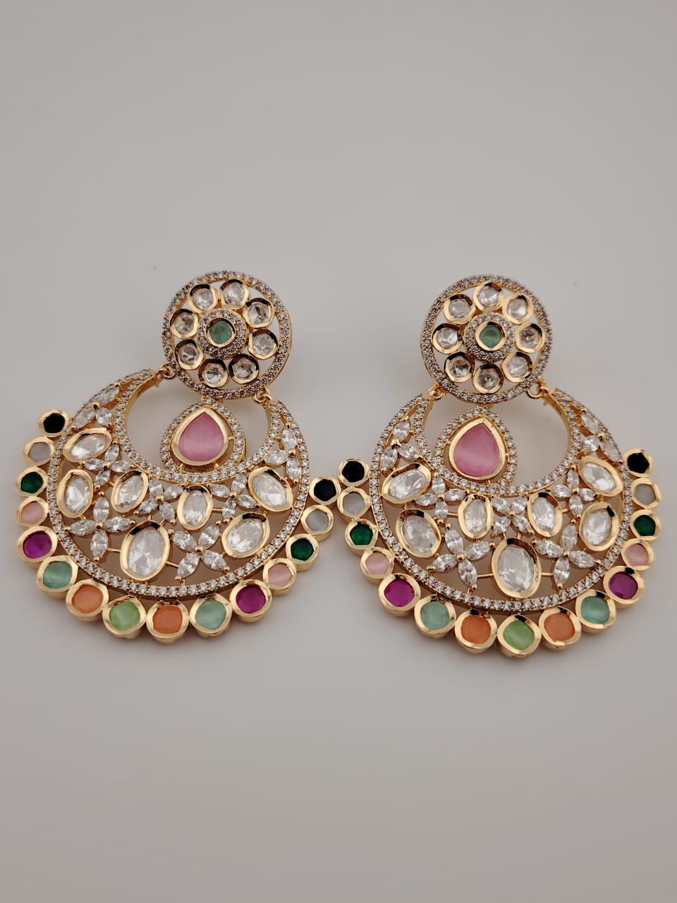 Statement kundan chandbaali with pota stones.